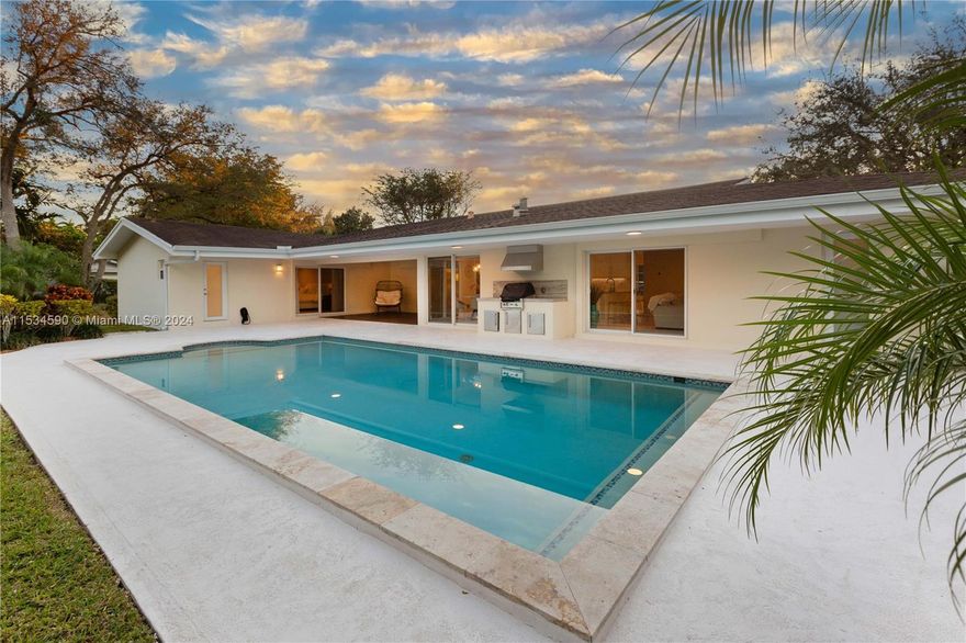 Beautiful and Airy Pinecrest Ranch home on a generous half-acre.  4-Bedrooms, 3-Baths.  Oolitic Limestone entrance leads to a beautiful and spacious living area overlooking the pool.  The home has been tastefully updated and has impact windows throughout, indoor laundry room, eat-in Kitchen with a nice island and a nice patio for entertaining.  Professionally landscaped with a circular driveway, two car garage and detached shed.  This is a great home in the heart of pinecrest.