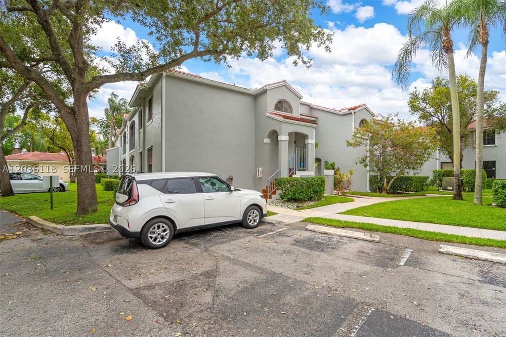 Photo of 12026 NW 11th St #12026, Pembroke Pines, FL 33026 (MLS # A12036118)