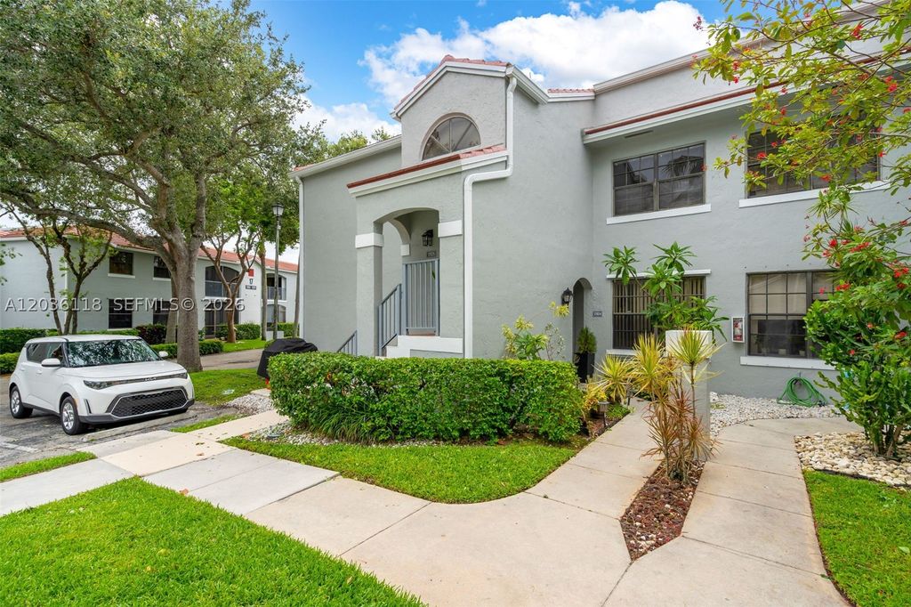 Photo of 12026 NW 11th St #12026, Pembroke Pines, FL 33026 (MLS # A12036118)