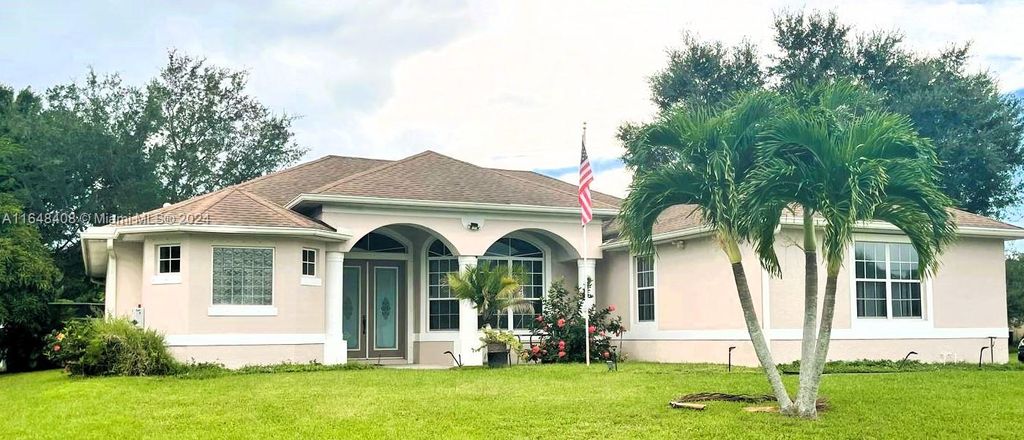 Photo of 3802 SW Crary St #3802, Port Saint Lucie, FL 34953 (MLS # A11648408)