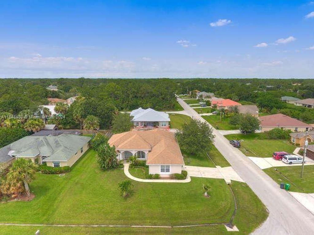 Photo of 3802 SW Crary St #3802, Port Saint Lucie, FL 34953 (MLS # A11648408)