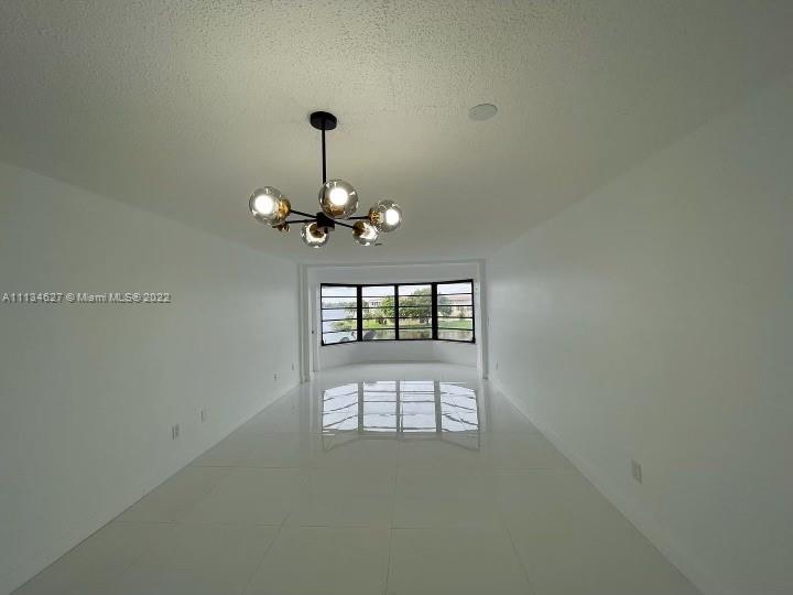 MOVE IN READY!!! Completely RENOVATED waterfront CORNER UNIT. Porcelain floors throughout. NEW full bathroom with shower (never used).
NEW light fixtures. As soon as you walk in you will observe the peaceful & tranquil water views. Amazing views from master bedroom. Completely gated community. White kitchen with granite counter tops, stainless steal appliances. Be the first one to enjoy this gorgeous renovation! BRAND NEW washers & dryers on each floor (3 floors building with elevator)
Call for appt.