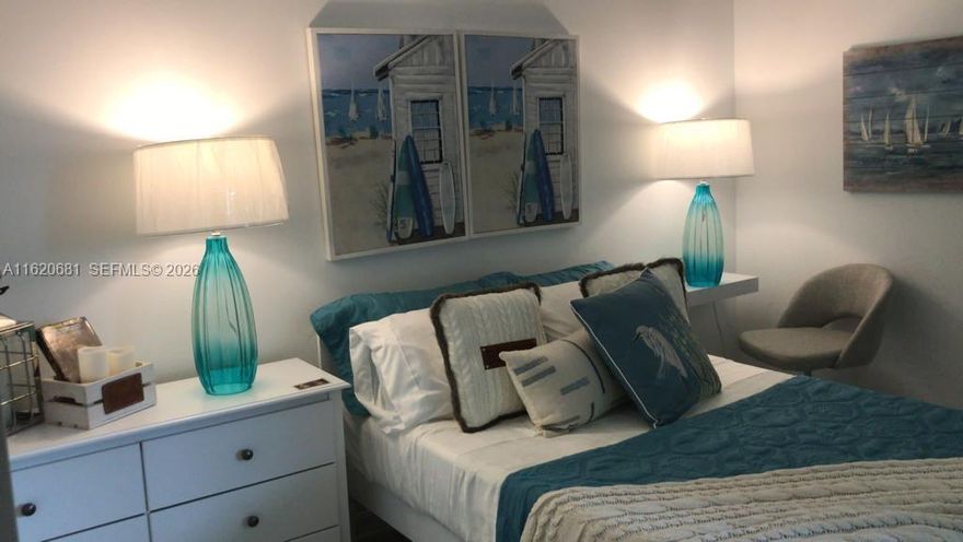 Lake front 2 Bedroom + Den , 2 Baths split floor plan with lake views. Golf membership included.
Exceptional end unit Diangelo II floorpan!  1st floor unit offers 2 bedrooms + a den and 2 full bathrooms and a 1 car garage. This unit has amazing views of the lake and hole 14 of the golf course at the prestigious Gordon Lewis designed course at the National Golf and Country Club. Gated community offers true country living with full spa, gym, pool, restaurants, pickleball, tennis, bocce ball, chickee bar and unlimited golf! Unit is walking distance to all amenities. Upgrades include crown molding, custom window treatments, custom paint, ceiling lights, glass shower enclosures...and much more