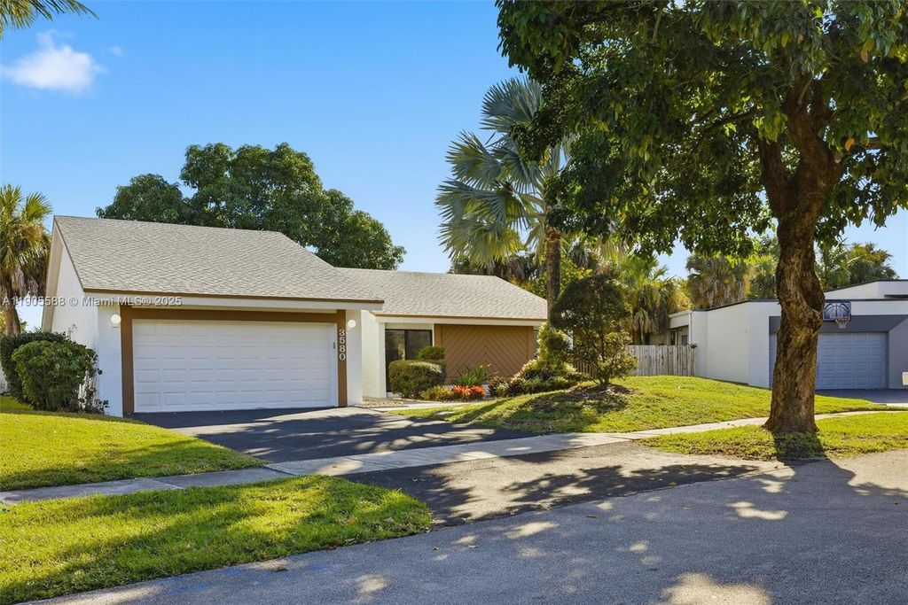 Photo of 3580 NW 73rd Ave, Lauderhill, FL 33319 (MLS # A11905588)