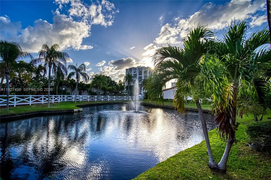 Absolutely gorgeous 1 story townhouse on the water! Waterfront villa in Harbourwood Villas, Three Islands. Spacious and well-maintained 2 bedrooms /2 bathrooms with 1,680 SF of living area on a 2,125 SF lot. Family room may be converted to a potential third bedroom. Stunning Water view from the patio! tranquil pond views and partial marina views from this desirable corner Townhouse! Features include a remodeled kitchen with window, stainless steel appliances, new A/C, high vaulted wood-beam ceilings, impact windows and doors, tile flooring throughout, new water heater, 4 skylights, and 2 walk-in closets. Large paved and covered rear patio ideal for entertaining, plus a welcoming front porch. Two assigned parking spaces directly in front of the unit. Community amenities include pool, tennis courts, racquetball, sauna, and walking paths. Excellent location within walking distance to shops, restaurants, and the beach. Minutes to Gulfstream Park and close to two international airports.