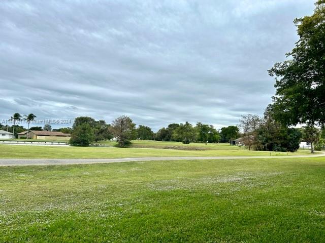 MOVE RIGHT IN!! GOLF COURSE AND WATER VIEW... 2 BEDROOM-2 BATHROOM "PENTHOUSE" UNIT. NEW FLOORING AND PAINT!! EAT IN KITCHEN, LARGE FAMILY ROOM & SEPERATE DINING AREA, SPACIOUS BEDROOMS WITH A SPLIT PLAN. NEW FLOORING AND PAINTING! SCREENED IN PATIO WITH STORAGE, LOTS OF CLOSET SPACE WITH BUILT INS, NEWER AC UNIT & AN EXTERNAL STORAGE UNIT. 25 MIN FROM BEACHES AND FT. LAUDERDALE INTERNATIONAL AIRPORT. CLOSE TO MAJOR HIGHWAYS, SHOPPING CENTERS, PLACES OF WORSHIP, SAWGRASS MALL, RESTAURANTS, AND MORE. ACTIVITIES INCLUDE, CLUBHOUSE, BILLIARDS, TENNIS AND SEVERAL POOL AREAS. *PRICE REDUCTION!!**
