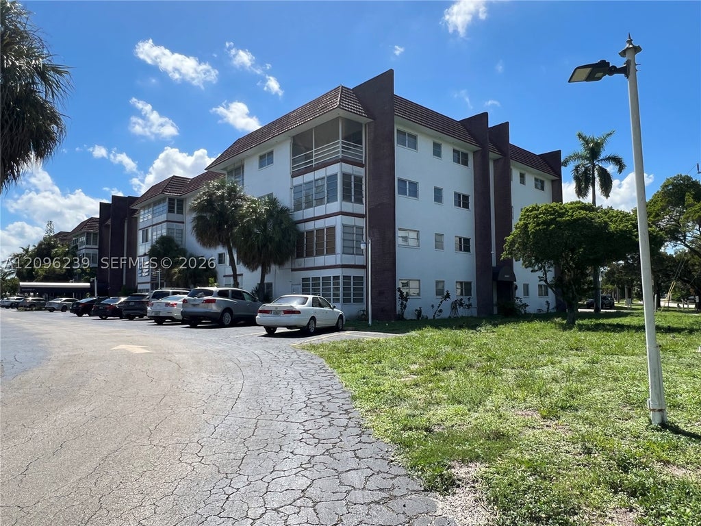 Photo of 2061 NW 47th Ter #207, Lauderhill, FL 33313 (MLS # A12096239)