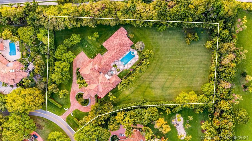 La Estancia - a signature estate on 3.6 ACRES in prestigious Windmill Ranch Estates!  An opportunity like this is rare especially from a HIGHLY MOTIVATED SELLER. Connected guest house with kitchen, theatre, game room and in-law quarter all on 1st level. Enveloped in privacy, fenced with huge grassy area. There is no need to leave home when you have such wonderful space and amenities!  Big swimming pool with in-pool spa.  Timeless elegance affords you to move right in or update to your desired tastes. Floor plan and dimensions are as you would design a new house today. Expansive kitchen opens to family and covered poolside patio with summer kitchen. Wet bar in living room makes you want to linger with family and friends. Stunning porte-cochère entry and Chicago brick driveway