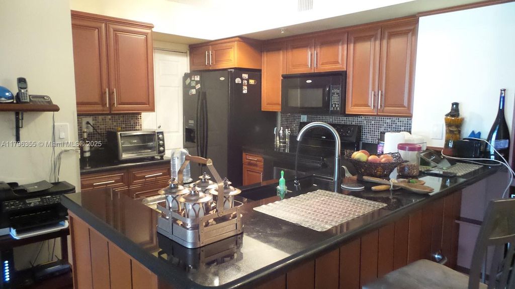 Photo of 2600 S University Dr #212, Davie, FL 33328 (MLS # A11796355)