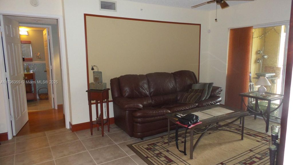 Photo of 2600 S University Dr #212, Davie, FL 33328 (MLS # A11796355)