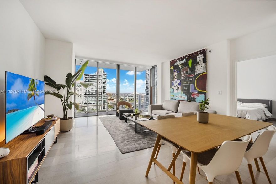 Seller motivated – lowest-priced 3-bedroom in Reach. Asking price is further negotiable. Fully furnished, designer finished, turnkey, with parking for two vehicles and an EV charger. This 3 Bed + Den, 3.5 Bath at Brickell City Centre offers 1,641 sq. ft. of elegant living space with sweeping river & skyline views. Floor-to-ceiling glass, marble floors, walk-in closets, sleek open kitchen. Amenities: pool & spa deck, fitness center, BBQ grills, play area, business center, and private direct access to Brickell City Centre.