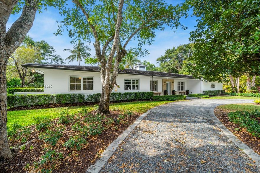 Fully remodeled 4-bed, 3-bath home, completed in 2015, situated on a tranquil cul-de-sac is just moments from Fairchild Tropical Garden & Matheson Hammock Park. The inviting living room opens to a pool area, creating an effortless flow for indoor-outdoor living. Updated kitchen with breakfast area adjoins an expansive family room with fireplace, open bar, and wine cellar. The thoughtful layout ensures privacy, while an extra flex room offers endless possibilities as a guest suite, gym, or home office. Set on a generous 20,000 SF lot, the outdoor space features a sparkling pool and deep covered patio. Ideally located in the Pinecrest Elementary School District just minutes from the best shopping, dining, and schools in Coral Gables, Coconut Grove, South Miami, and Pinecrest.