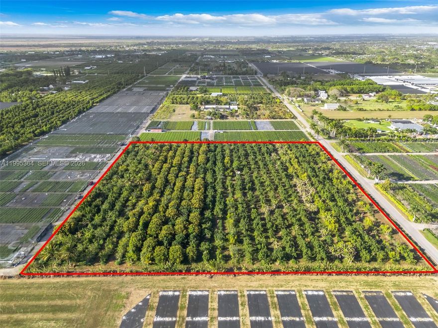 Prime 10-acre Redland agricultural opportunity (Folios: 30-6815-000-0143 & 30-6815-000-0144). Both parcels
must be sold together. West of Krome Ave with excellent paved road access near major thoroughfares. Situated in
one of Redland’s most desirable agricultural pockets known for deep, nutrient-rich soil, open skies and a thriving
farming culture. Productive avocado grove featuring various avocado varieties along with banana, papaya, and
mango trees. Property includes sprinkler irrigation, two wells and a Detroit diesel pump. Zoned AU Agricultural
with potential for one estate home per 5 acres (possible two estate homes). Ideal for nursery operations, tropical
fruit production, agribusiness or a private agricultural estate.
