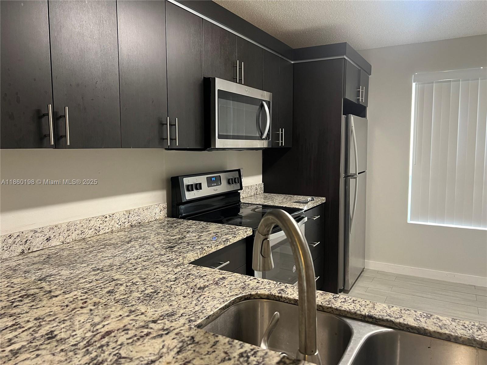Impressive 1 bedroom, 1 bathroom condo apartment on the 2nd fl. Stainless steel appliances and granite counter tops. Walk-in closet in the bedroom. Newer washer/dryer. Screened in balcony for the convenience of having extra space and enclosed laundry room in the balcony. Parking is just in front of the apartment. Swimming pool and playground in a gated community. Great neighborhood and location to live in. Tenant occupied until 9/30.
