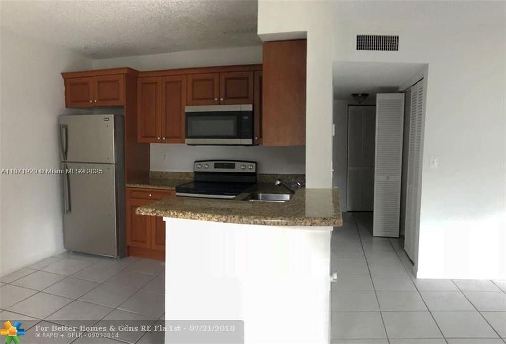 Photo of 11449 NW 42th St #11449, Coral Springs, FL 33065 (MLS # A11871920)