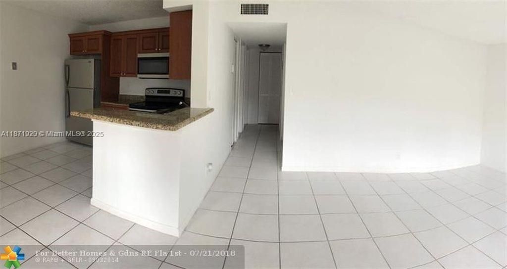 Photo of 11449 NW 42th St #11449, Coral Springs, FL 33065 (MLS # A11871920)