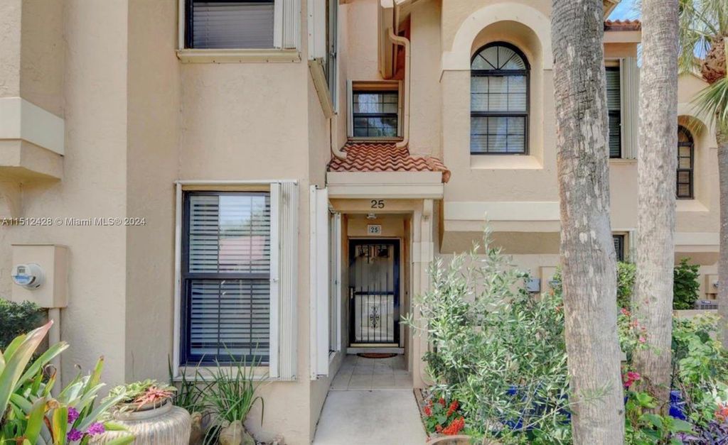 Photo of 2379 Treasure Isle Dr #25, Palm Beach Gardens, FL 33410 (MLS # A11512428)