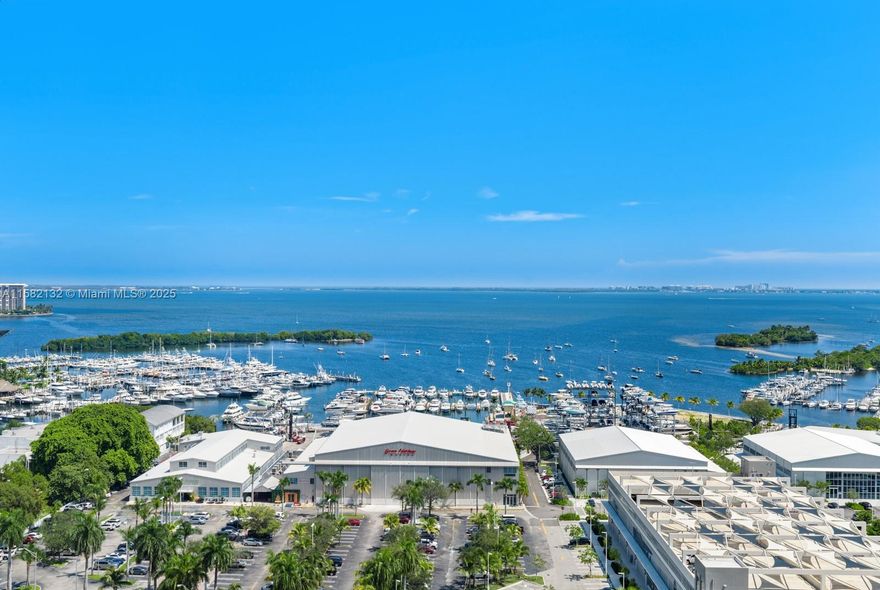 Located in the heart of Coconut Grove. 3 bed 3.5 baths duplex condo with floor to ceiling windows that showcase direct views of Biscayne Bay from every room. A stately entry way welcomes you to the main floor of living with gourmet kitchen outfitted with Miele appliances and custom wine display and wet bar. Situated off of the living room is an expansive terrace that can also be accessed from the primary suite that includes spa shower, soaking tub and separate walk in closet. The lower level features two additional bedrooms with ensuite baths and direct access to the second private terrace. Designed by Local designer, Maris Rafa. Amenities include state of the art fitness center, spa, concierge, valet, butler service, roof top terrace and more.