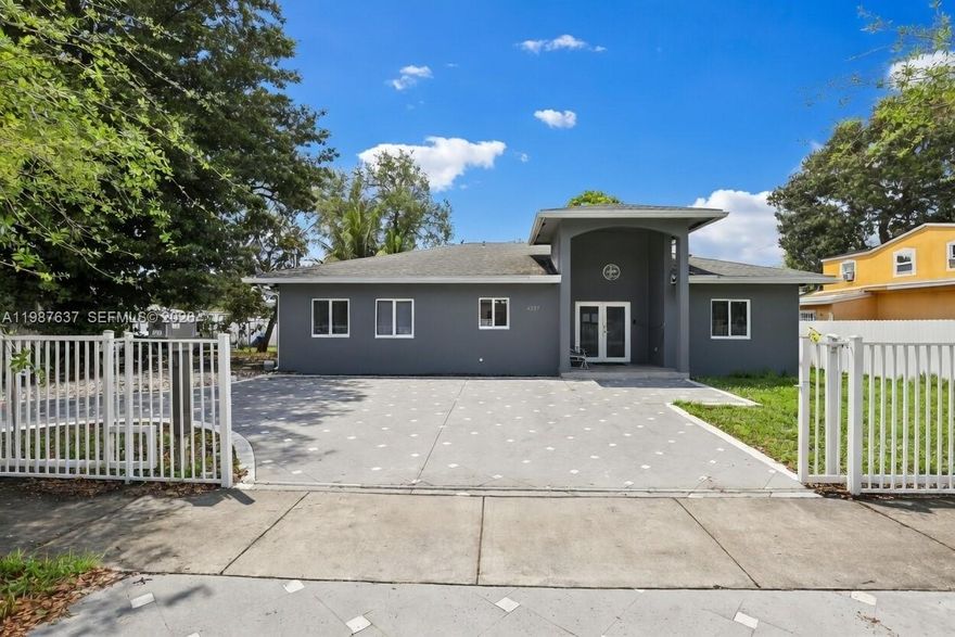 Welcome to this modern 2018-built home offering space, style, and flexibility in the heart of Miami. Situated on a spacious 7,500 sq ft lot, this property features 4 bedrooms and 3 bathrooms, plus 2 additional flex rooms currently being used as bedrooms—perfect for large families or income-producing potential.

Step inside to an open and airy layout highlighted by high ceilings and a grand entryway with chandelier, creating a bright and inviting atmosphere. The home features porcelain tile flooring throughout, a modern kitchen with quartz countertops and stainless steel appliances, and well-designed living spaces ideal for both everyday living and entertaining.

The primary suite offers generous space and a walk-in closet, while the overall layout allows for multi-generational living or room-by-room rental opportunities.

Enjoy added value with impact windows and doors, a private driveway, and no HOA restrictions. The oversized lot provides ample space for outdoor living, with room to add a pool, park multiple vehicles, or store a boat.

Ideal for investors, large families, or buyers seeking a newer construction home with strong income potential.