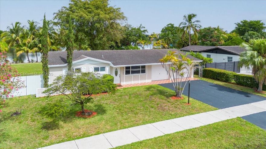 Discover the charm of this inviting 3-bedroom, 2-bath home at 7700 SW 137th Court! Situated in a peaceful neighborhood with serene lake views, this home features spacious living areas, impact windows, a new roof, and a very spacious backyard. Conveniently located just minutes from top-rated schools, it offers the perfect blend of comfort and convenience—an ideal retreat in the heart of Kendale Lakes.