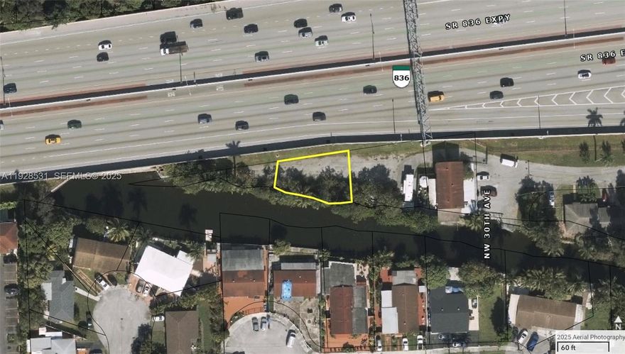 Outstanding 5,500 sq ft development parcel with duplex zoning, offering rare frontage exposure along the 836 Expressway and direct proximity to the Miami River. Positioned in a strategic growth corridor, only 5–7 miles from Miami International Airport and 7–9 miles from Downtown Miami—approximately 15 minutes to each. This high-visibility location presents exceptional income potential, including the opportunity for billboard signage due to freeway exposure. Recent area duplex builds are commanding values above $1M, confirming strong return prospects for developers and investors. Easement required for access/construction. A prime opportunity in one of Miami’s most dynamic infrastructure-linked zones. Seize this rare chance to build, invest, and capitalize.