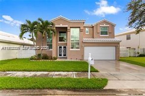 Photo of 1071 SW 101st Ter, Pembroke Pines, FL 33025 (MLS # A11975851)
