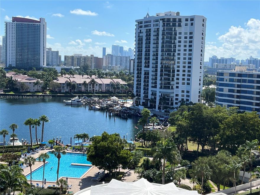 Welcome to your next home! This oversized 2-bedroom, 2-bath corner unit is perfect for families looking for comfort, convenience, and resort-style living. Featuring top-of-the-line Prestige High Impact windows and sliding glass doors, this unit is both beautiful and secure. Enjoy peaceful views of the tennis courts and serene bay/boat docks right from your window or private balcony. The modern kitchen comes fully equipped with stainless steel appliances—ready for family meals and entertaining. Administration Fee Includes: Building Exterior, Cable Tv, Water Common Area, Landscaping/Lawn Maintenance, Laundry Facilities, Parking, Pest Control Interior, Recreation Facilities, Reserve Fund, Security. *700 credit score required*