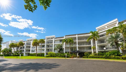Photo of 16051 Blatt Blvd #401, Weston, FL 33326 (MLS # A12032006)
