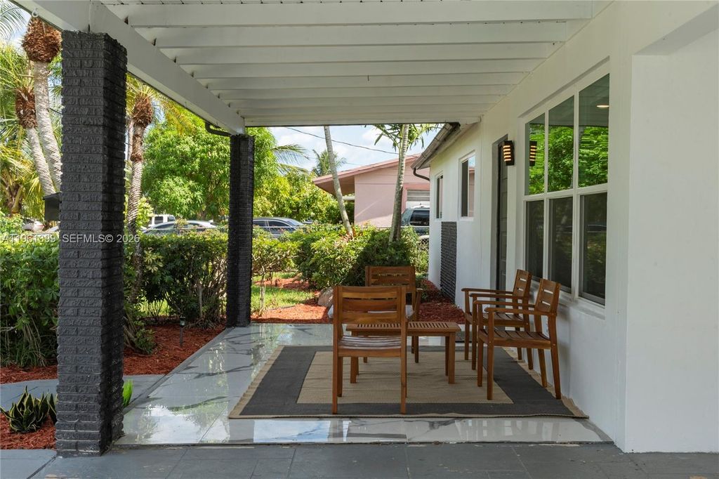 Photo of 390 NW 40th St, Deerfield Beach, FL 33064 (MLS # A11961399)