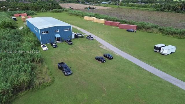 Great opportunity to BUY-LEASE or LEASE WITH OPTION TO BUY IN KROME AVE, MIAMI FL. Unique opportunity to buy a property with agricultural business related commercial potential.The possibilities are endless. 7000 SQFT FREE STANDING Warehouse on 4.6946 acres / 204,497 SQFT and almost 344 SQFT of frontage on Krome Avenue offering exposure to thousands of drivers a day. Office area with multiple offices 2,500 sqft. Finished Showroom 2500 sqft, Warehouse area 2500 sqft 4 Loading bays and a loading ramp. Primary Land Use 4837 WAREHOUSE TERMINAL OR STG : WAREHOUSE OR STORAGE. The seller will consider financing depending on the offer.