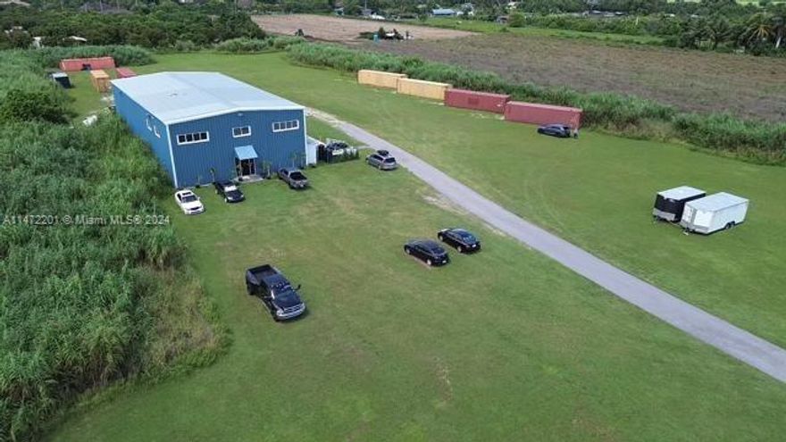 Great opportunity to BUY-LEASE or LEASE WITH OPTION TO BUY IN KROME AVE, MIAMI FL. Unique opportunity to buy a property with agricultural business related commercial potential.The possibilities are endless. 7000 SQFT FREE STANDING Warehouse on 4.6946 acres / 204,497 SQFT and almost 344 SQFT of frontage on Krome Avenue offering exposure to thousands of drivers a day. Office area with multiple offices 2,500 sqft. Finished Showroom 2500 sqft, Warehouse area 2500 sqft 4 Loading bays and a loading ramp. Primary Land Use 4837 WAREHOUSE TERMINAL OR STG : WAREHOUSE OR STORAGE. The seller will consider financing depending on the offer.