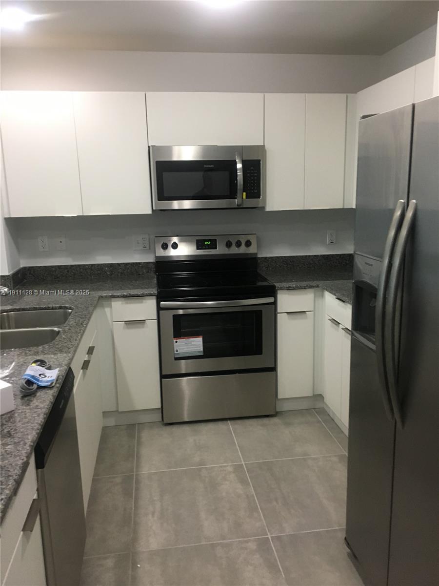 EAST 10TH AVENUE II CONDO - Residential Lease
