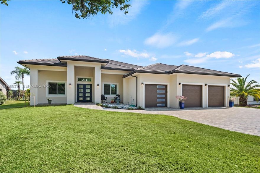 Experience unparalleled luxury and modern convenience in this exquisite 2022 Riverfront custom-built 3-bedroom, 3-bathroom. Designed with meticulous attention to detail and boasting top-of-the-line upgrades, this property is the epitome of refined living. Enjoy the serene river views and easy water access with a brand new 10,000lb boat lift and dock, perfect for boating enthusiasts. The chef’s kitchen features a 36-inch column Thermador built-in fridge, a 24-inch column Thermador built-in freezer, a 36-inch induction cooktop, and a Thermador speed oven combo, custom wood cabinets and leathered granite countertops add elegance and functionality. Wall-to-wall cabinets in the butler’s pantry - This home is a rare gem of luxury & comfort with so many upgrades, contact agent for a full list