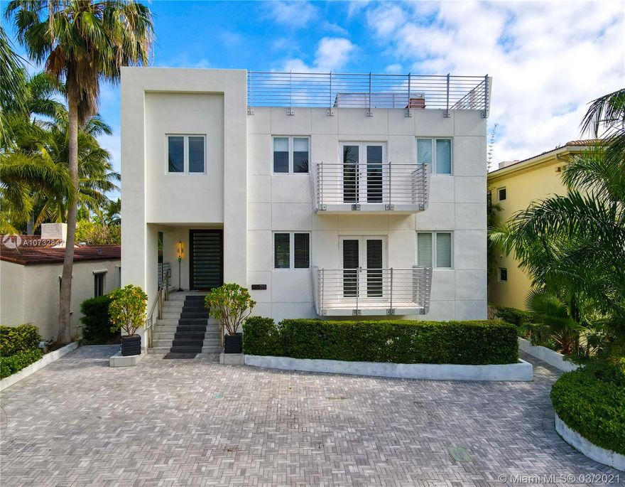 Modern, fully upgraded, three-story residence on prestigious Palm Island. In addition to the grand living and family room, open kitchen, two master suites, imported Italian finishes, this home has 2,500 SQ FT large sky terrace offering stunning water and sunset views. All impact glass windows, custom closets, cameras, security and sound system, are part of this rarely large home.