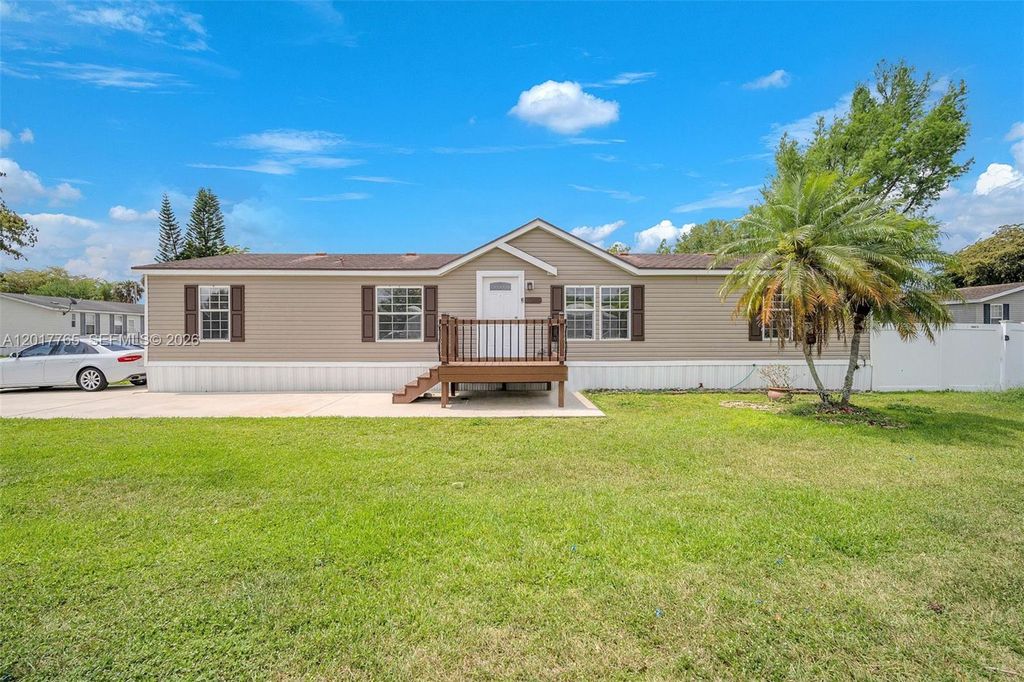 Photo of 730 NW 217th Ter, Pembroke Pines, FL 33029 (MLS # A12017765)