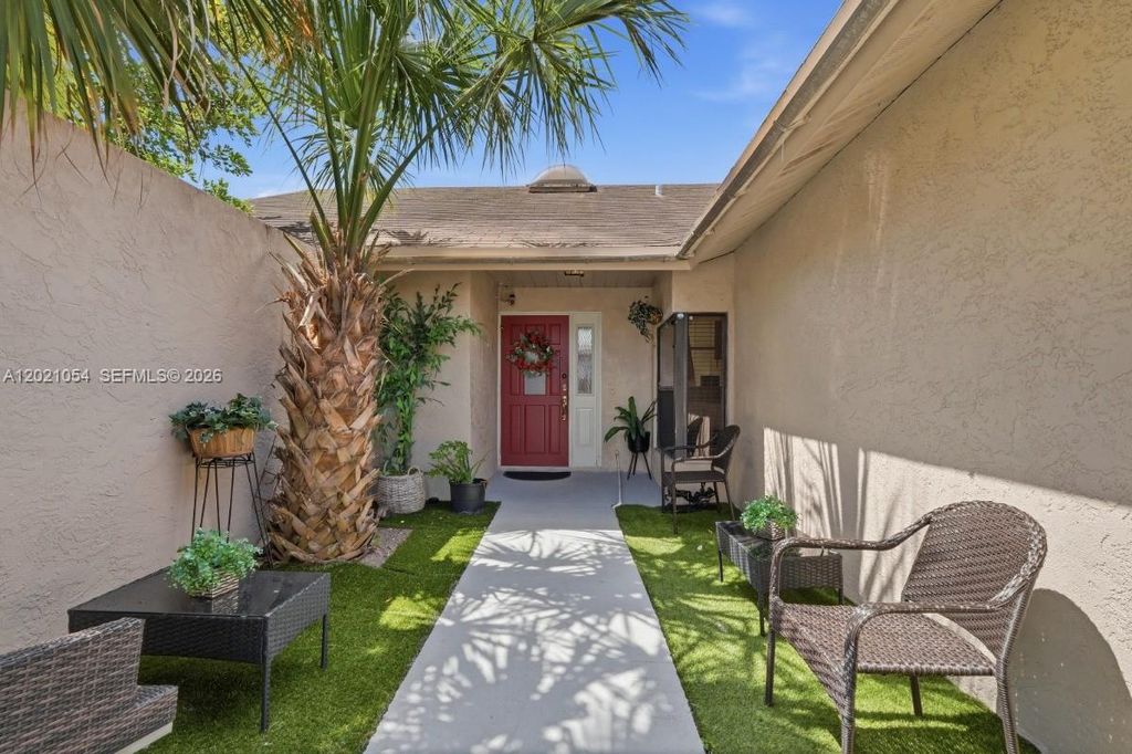 Photo of 4080 NW 1st Pl, Deerfield Beach, FL 33442 (MLS # A12021054)