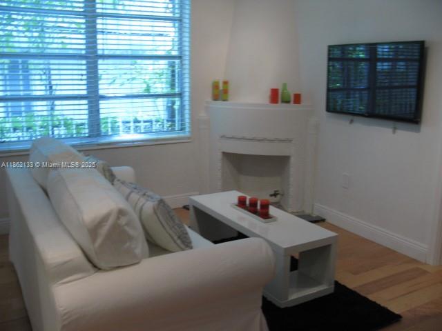 Great FURNISHED apartment. 1 block from Lincoln Road. Beautiful wood floor, modern kitchen and appliances, bathroom and new bedroom. Large LCD high definition tv. Great unit to live in or for a vacation home. Don t miss it. Easy to show. W/D on promises. YEARLY RENTAL. FIRST, LAST AND SECURITY NO EXCEPTIONS. NO PETS. BROKER REMARKS FOR SHOWING INSTRUCTION