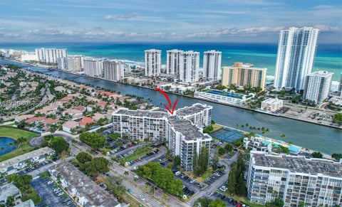 Photo of 1000 Parkview Dr #825, Hallandale Beach, FL 33009 (MLS # A12068053)