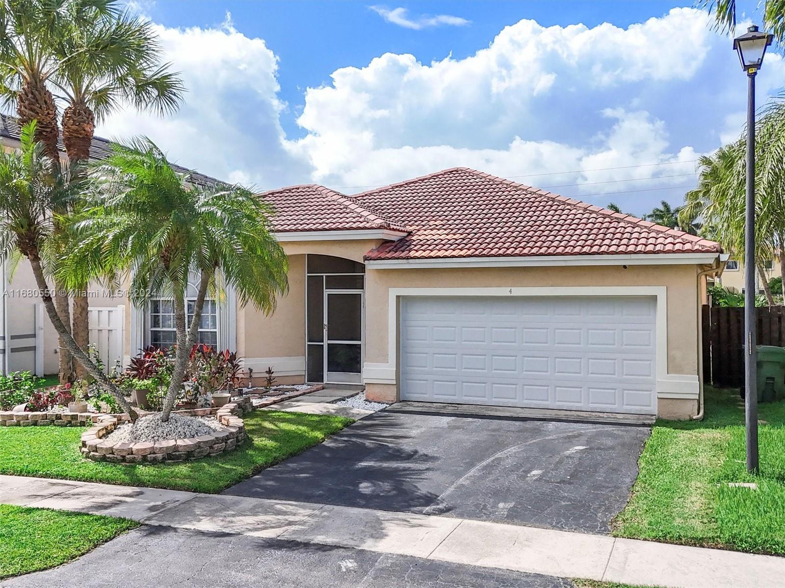 Beautifully upgraded 3-bedroom, 2-bath home with a 2-car garage, located in the highly desirable Gables community in Weston. This spacious property features a newer kitchen equipped with white shaker cabinets, sparkling white quartz countertops, a gas cooktop, oven, and a quiet Frigidaire dishwasher. Both bathrooms have been recently updated with matching quartz countertops, newer vanities, faucets, and undermounted sinks. The large primary suite includes a roman tub, oversized shower, and walk-in closet. Two additional bedrooms feature newer plush carpeting. Dual access to the large screened lanai. The home also boasts NEWER plumbing and piping.
