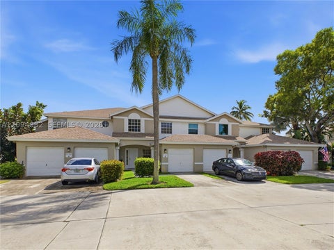 Photo of 9100 Boca Gardens Pkwy #B, Boca Raton, FL 33496 (MLS # A12094082)
