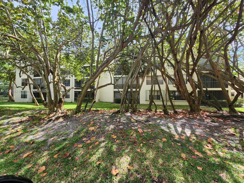 Photo of 2302 S Cypress Bend Dr #207, Pompano Beach, FL 33069 (MLS # A11548782)