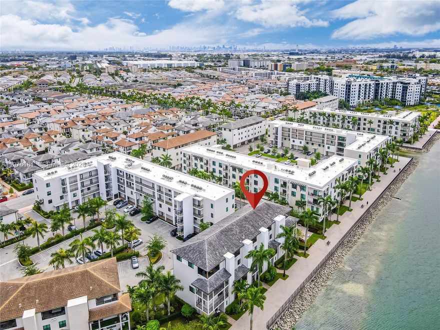 Stunning fully renovated lakefront townhouse located in the highly desirable Downtown Doral community. This elegant residence offers breathtaking direct lake views and a bright modern interior completely painted in white, creating a sophisticated and airy ambiance throughout the entire home. The property features beautiful porcelain floors, an in-home elevator providing comfort and convenience across all levels, and electric blinds integrated with a smart home Alexa system allowing effortless control of lighting and window treatments.
The spacious open concept layout is designed for both comfort and modern living, offering generous living areas filled with natural light and spectacular water views that create a peaceful and luxurious atmosphere. The modern living and dining areas flow seamlessly, making the home ideal for entertaining guests or enjoying everyday living while overlooking the tranquil lake.
Outdoor living is equally impressive with a private terrace area perfect for barbecues and gatherings while enjoying the serene lake setting. The property also includes elegant Italian furniture designed for TV installations, adding a refined and functional touch to the living spaces.
Located just steps from the vibrant Downtown Doral district, residents enjoy walking distance to restaurants, cafés, shops, parks, and entertainment while experiencing the tranquility of lakefront living.