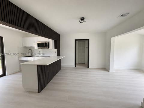 Tiny photo for 811 NW 65th St, Miami, FL 33150 (MLS # A12041652)