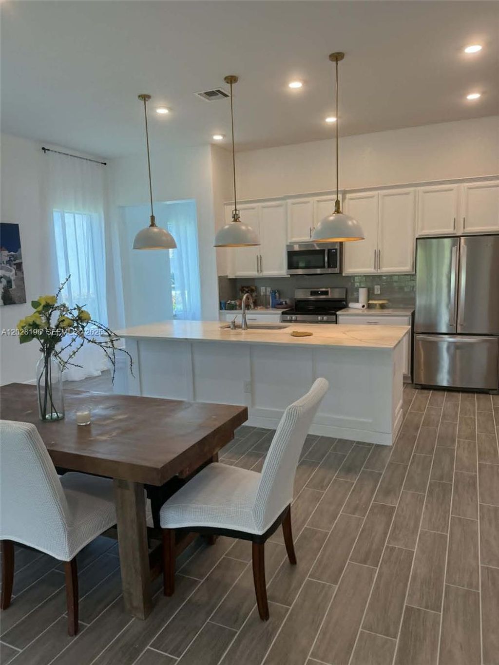 Photo of 4710 SW Ardsley Dr, Stuart, FL 34997 (MLS # A12028196)
