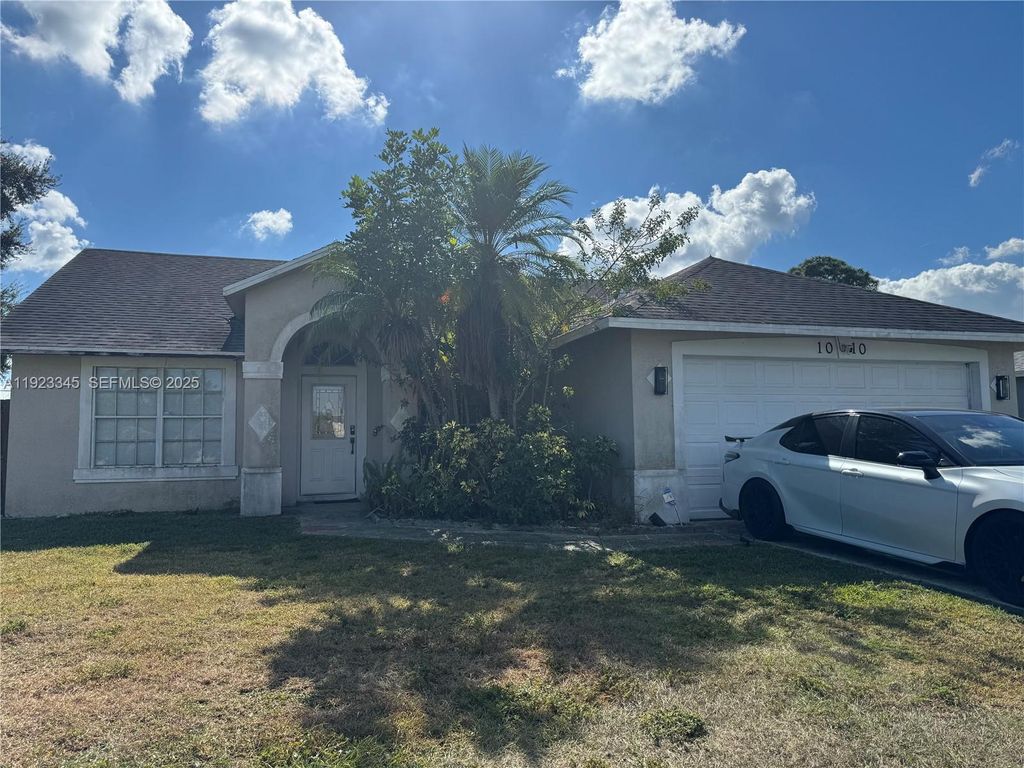 Photo of 1010 SW Mantilla Ave, Port St Lucie, FL 34953 (MLS # A11923345)