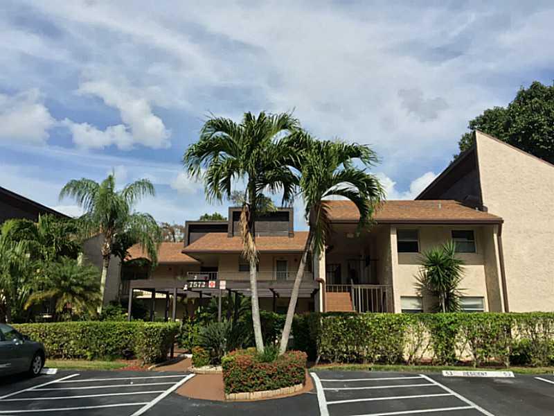 WOW! What a FANTASTIC VIEW! Spacious 1 bedroom, 1.5 bath with a DEN in quiet Woodmont CC Community. Has been COMPLETELY REMODELED down to the electrical. Completely updated Kitchen with new cabinets, counters, and Stainless Steel Appliances. Huge screen ed wraparound porch with BEAUTIFUL VIEWS of the golf course. Tile in living areas and new carpet in bedroom. Full size washer/dryer and LOTS of extra storage space. Vaulted Ceilings in living area. Furniture is available for 5k extra. Move-in ready.