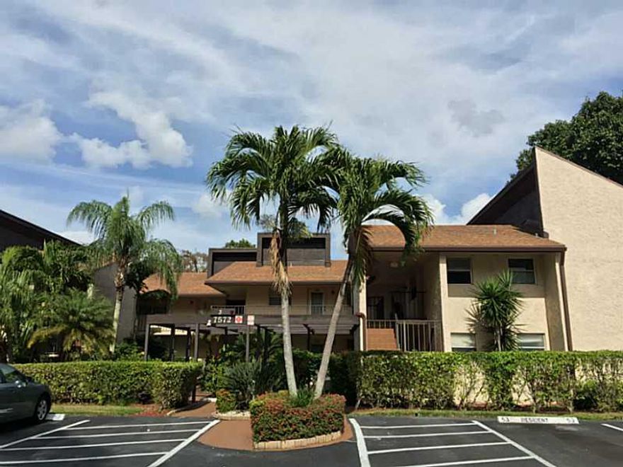WOW! What a FANTASTIC VIEW! Spacious 1 bedroom, 1.5 bath with a DEN in quiet Woodmont CC Community.  Has been COMPLETELY REMODELED down to the electrical.  Completely updated Kitchen with new cabinets, counters, and Stainless Steel Appliances. Huge screen ed wraparound porch with BEAUTIFUL VIEWS of the golf course.  Tile in living areas and new carpet in bedroom.  Full size washer/dryer and LOTS of extra storage space.  Vaulted Ceilings in living area.  Furniture is available for 5k extra.  Move-in ready.