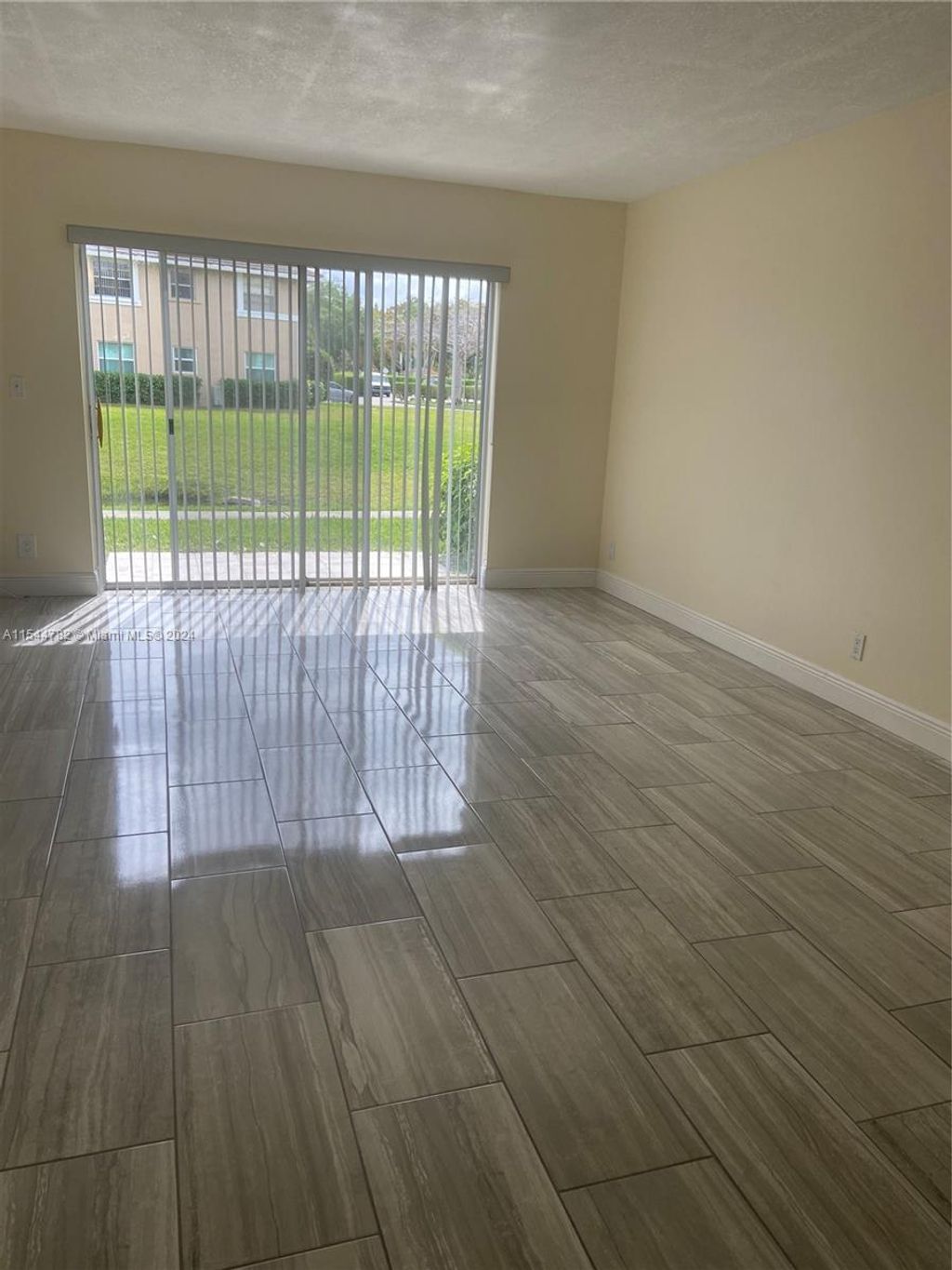 Photo of 10002 Twin Lakes Dr #6-A, Coral Springs, FL 33071 (MLS # A11544782)