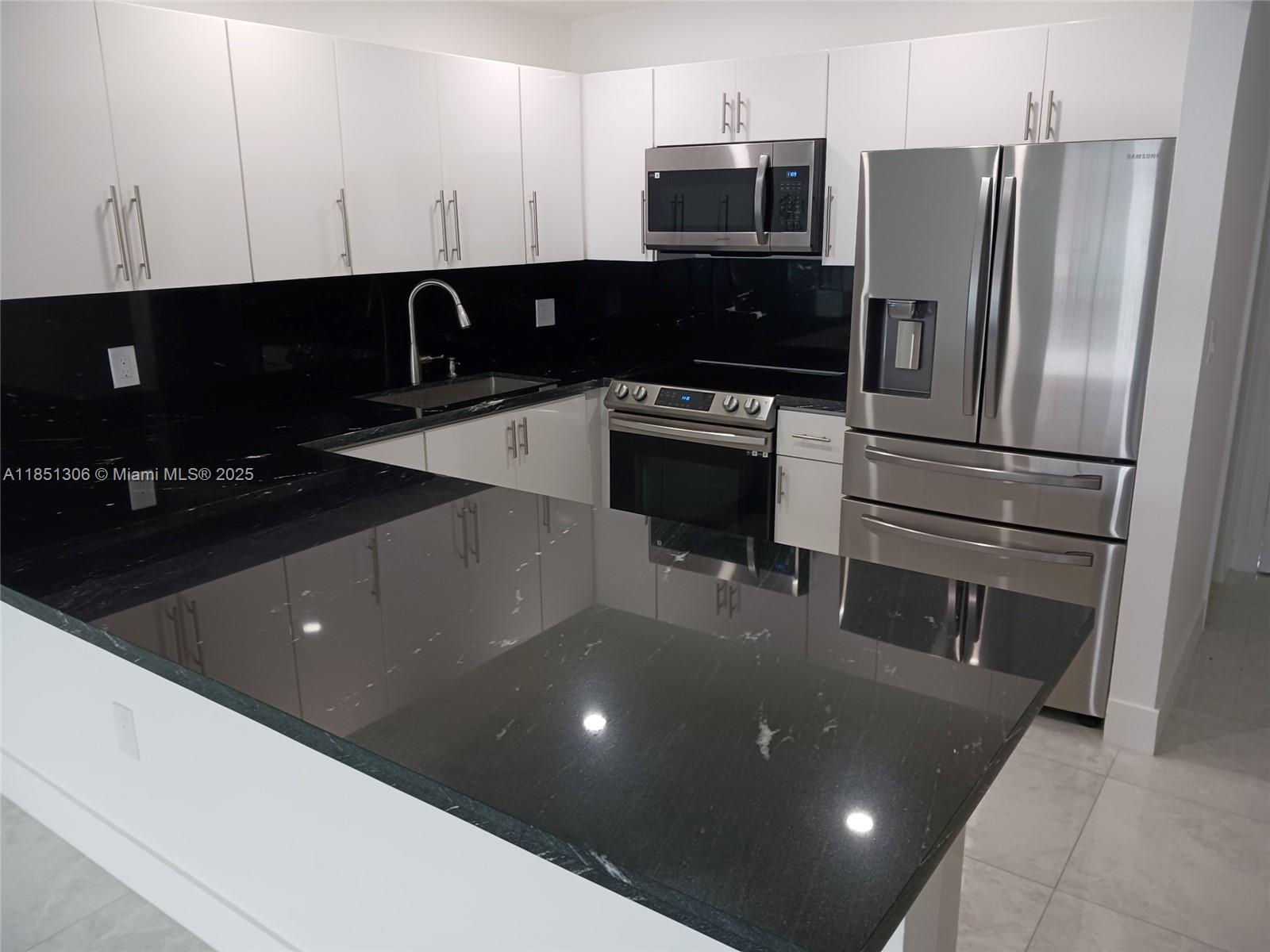 Welcome to Unit 315, a stunningly renovated 2-bedroom, 1-bath residence in the heart of Hialeah. This third-floor unit has been completely remodeled with brand-new porcelain floors, a modern kitchen with stainless steel appliances, contemporary lighting, and a beautiful new bathroom featuring sleek finishes. Every detail has been thoughtfully designed to offer comfort, style, and functionality. Come see for yourself! Please contact listing agent for showings.