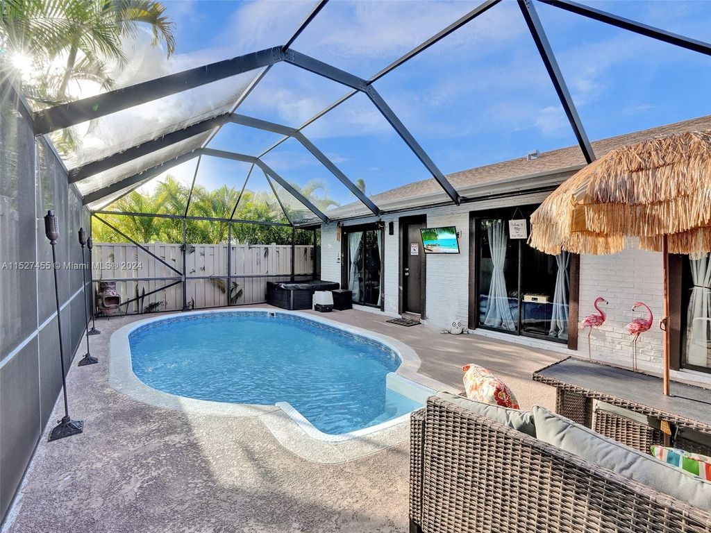 Photo of 9975 Boca Gardens Trl #D, Boca Raton, FL 33496 (MLS # A11527455)